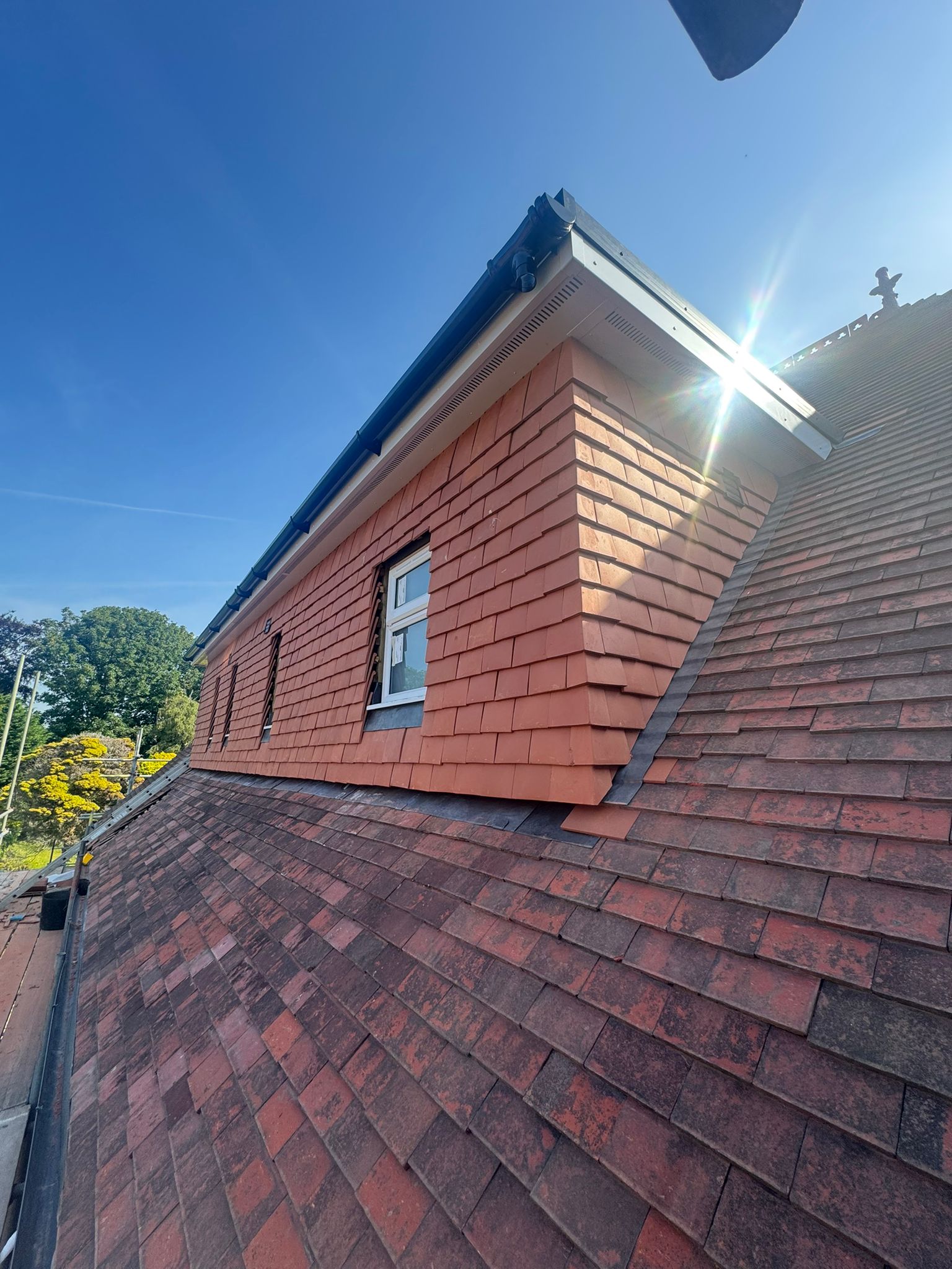 Dormer window added to a roof