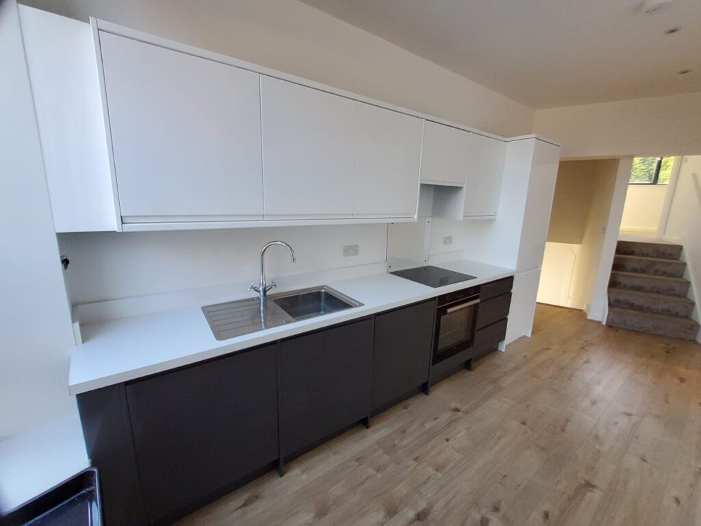 Grey fitted galley kitchen